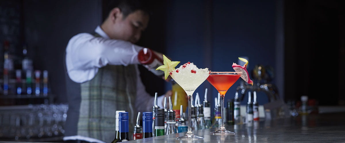 Cocktails being made in the North Cape Bar on Spirit of Adventure